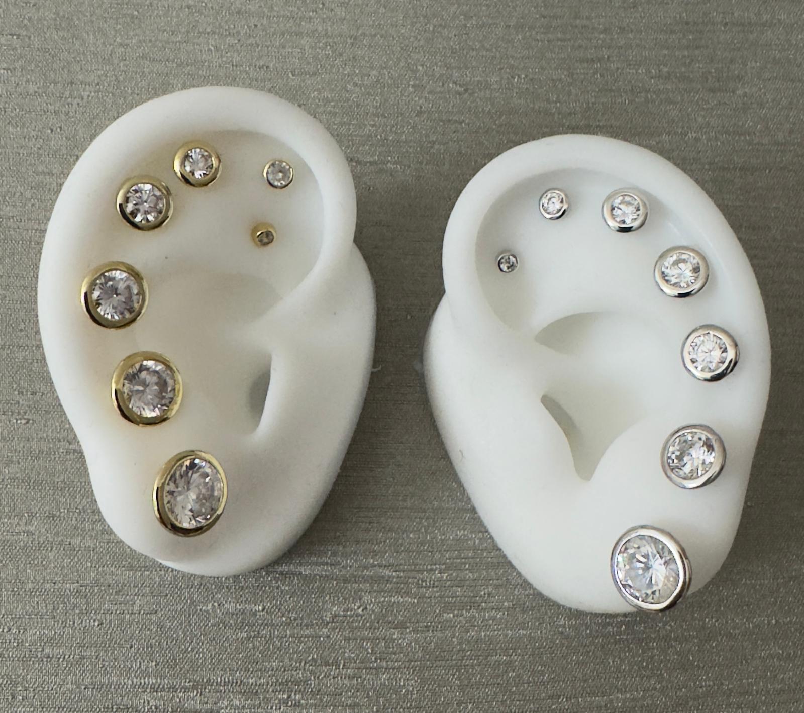 Bezel-set round cubic zirconia studs